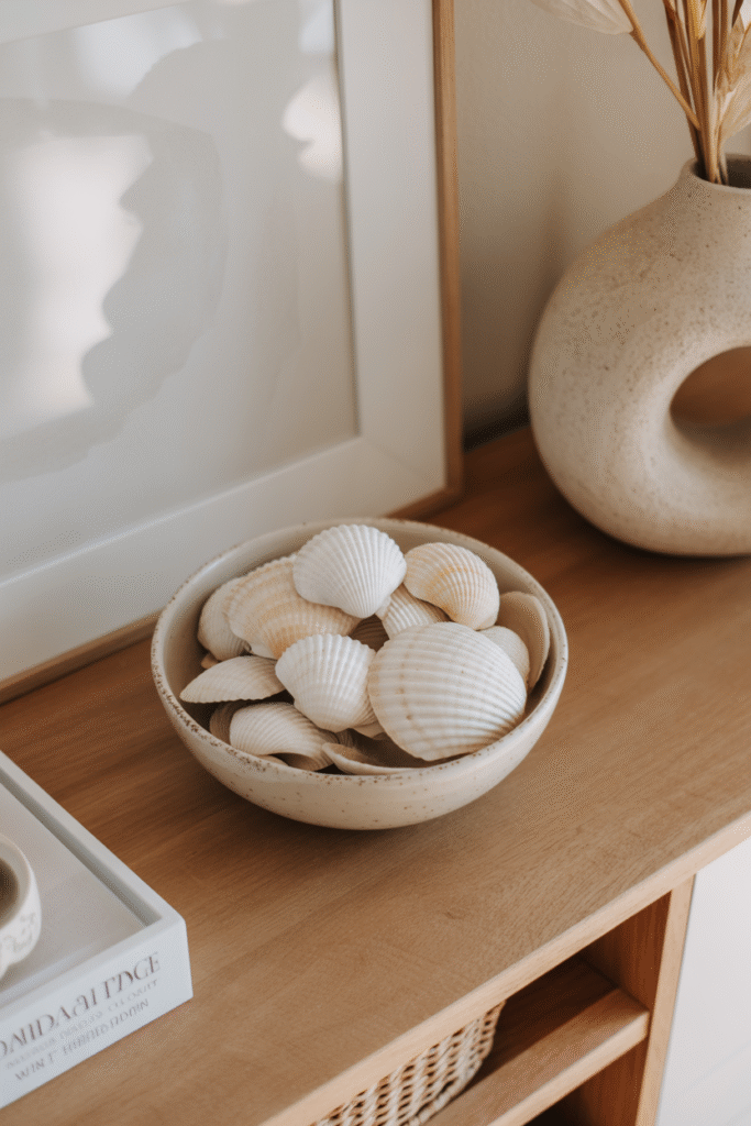 Simple shell display adds a beachy touch to a minimalist shelf.