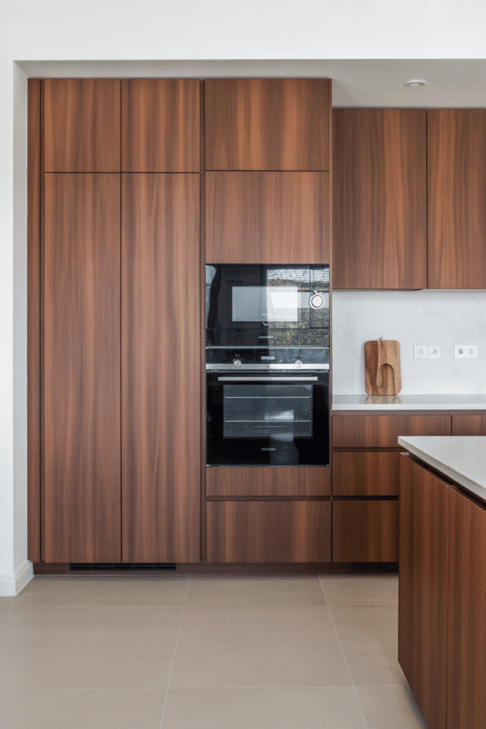 Built-in appliances hidden behind cabinetry for a clean, cohesive kitchen look.