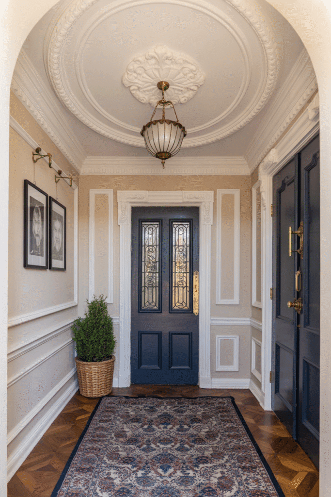 Ceiling medallions and molding layers add subtle dimension and timeless charm.
