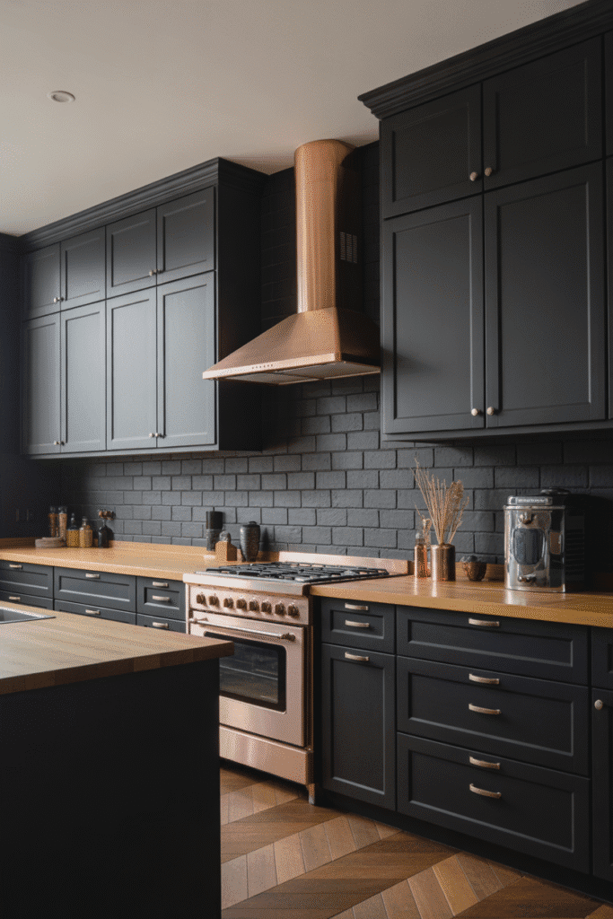 A standout range hood adds character and complements dark cabinet designs.