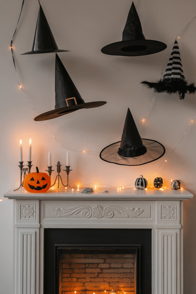 Floating witch hats above fireplace with Halloween fairy lights