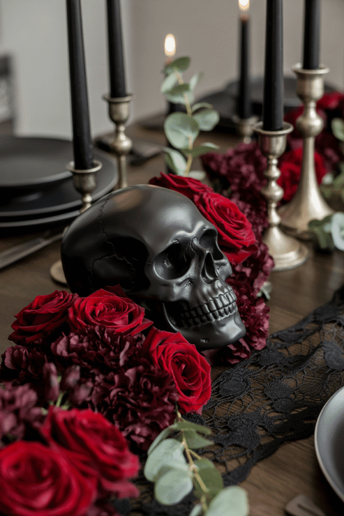 Elegant skull centerpiece on a Halloween dining table with moody floral accents
