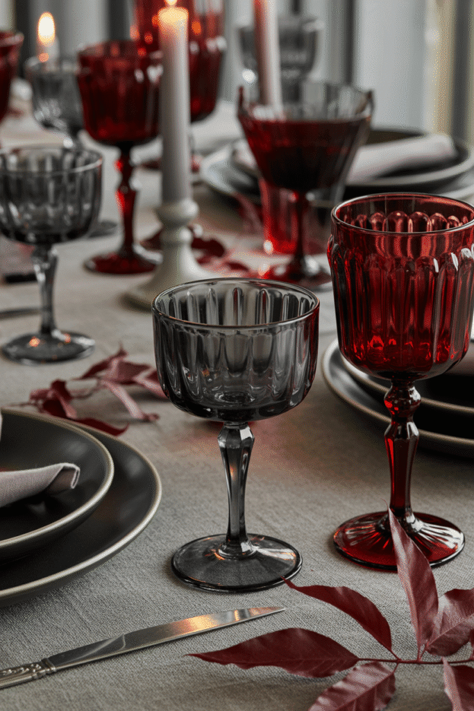 Vintage Halloween glassware in gothic tones for themed table decor.