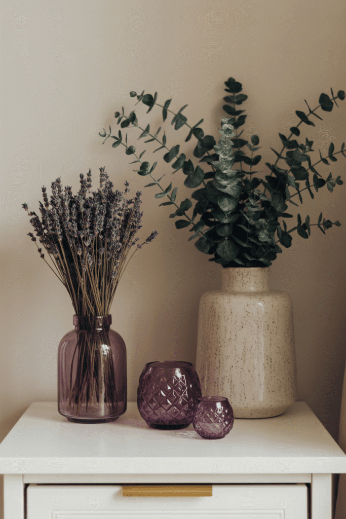 A moody bedside setup with dried purple botanicals for natural elegance and softness.