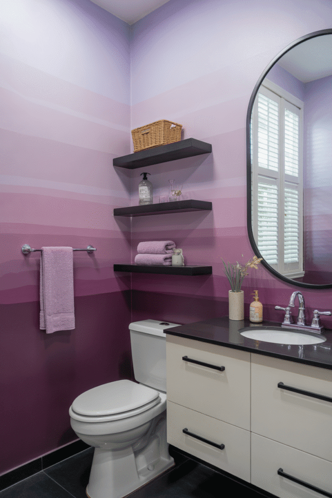 A gradient purple wall brings flow and softness to a visually striking bathroom design.