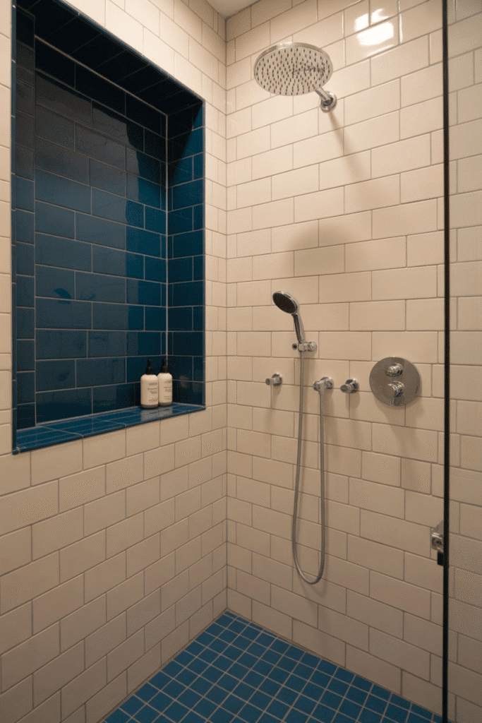 Bold patterned tiles in the shower niche create a stylish focal point in a tiny bathroom.